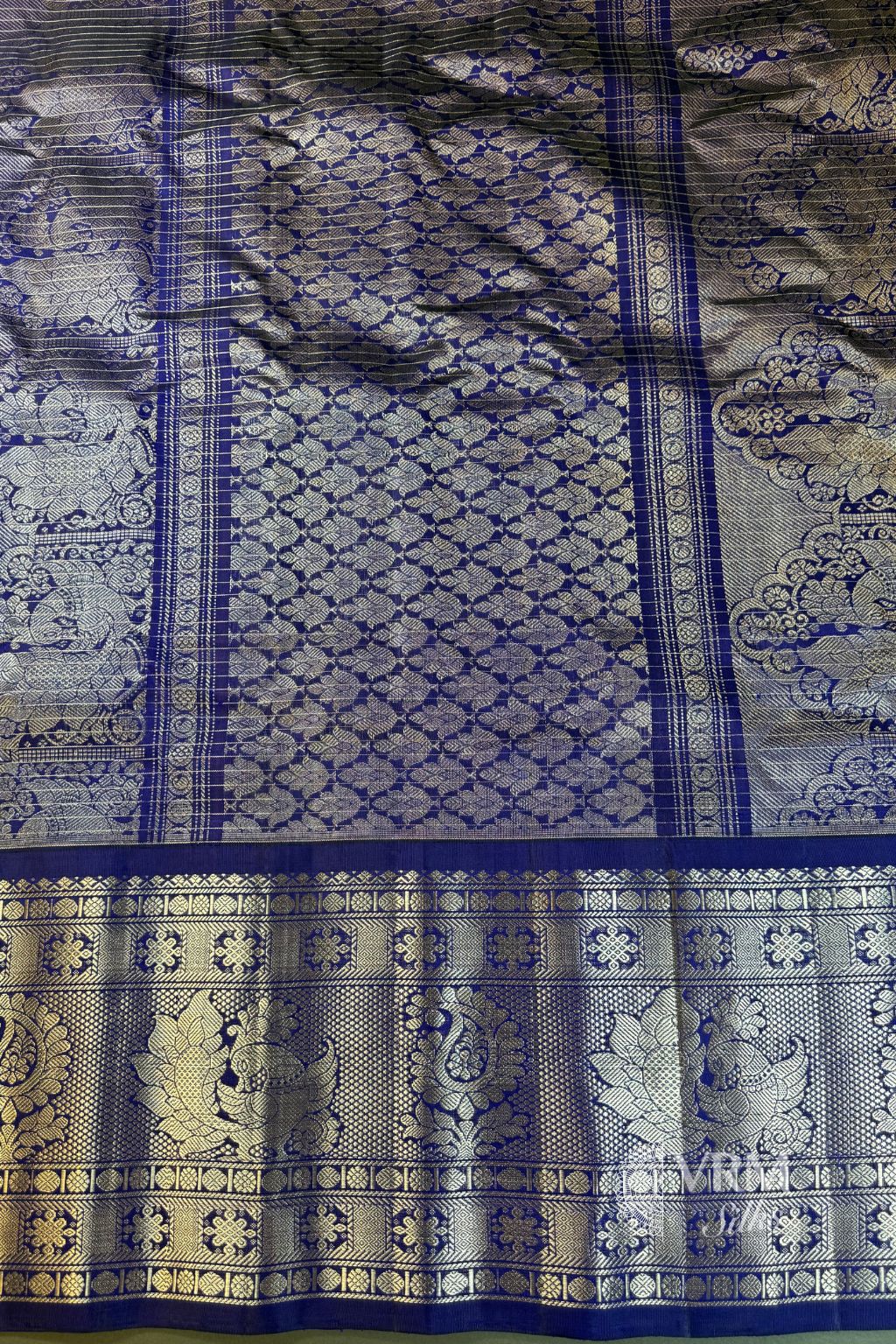 Elegant Gadwal Silk Saree Orange Body with Silver Zari Elegant Gadwal Silk Saree Orange Body with Silver Zari