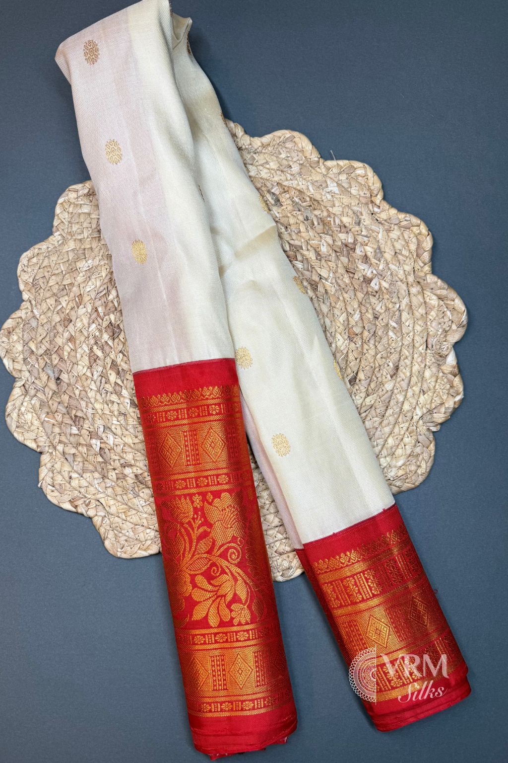 White Gadwal Silk Saree with Orange Border and Gold Zari White Gadwal Silk Saree with Orange Border and Gold Zari